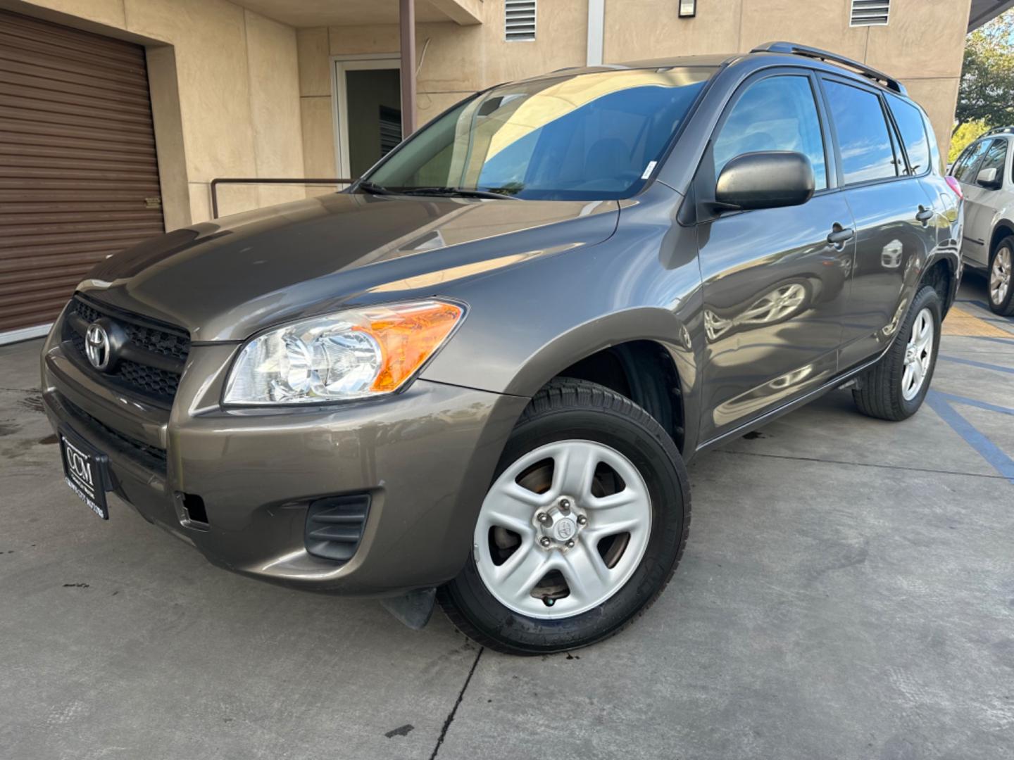 2012 Gray Toyota RAV4 Base I4 2WD with 3rd Row (2T3KF4DVXCW) with an 2.4L L4 DOHC 16V engine, 4-Speed Automatic transmission, located at 30 S. Berkeley Avenue, Pasadena, CA, 91107, (626) 248-7567, 34.145447, -118.109398 - Crown City Motors is a used “Buy Here Pay Here” car dealer in Pasadena CA. “Buy Here Pay Here” financing, means that when you purchase your vehicle from our dealership, that you make the payments to the dealership as well. We do not need the banks approval to get you approved for a used auto - Photo#1